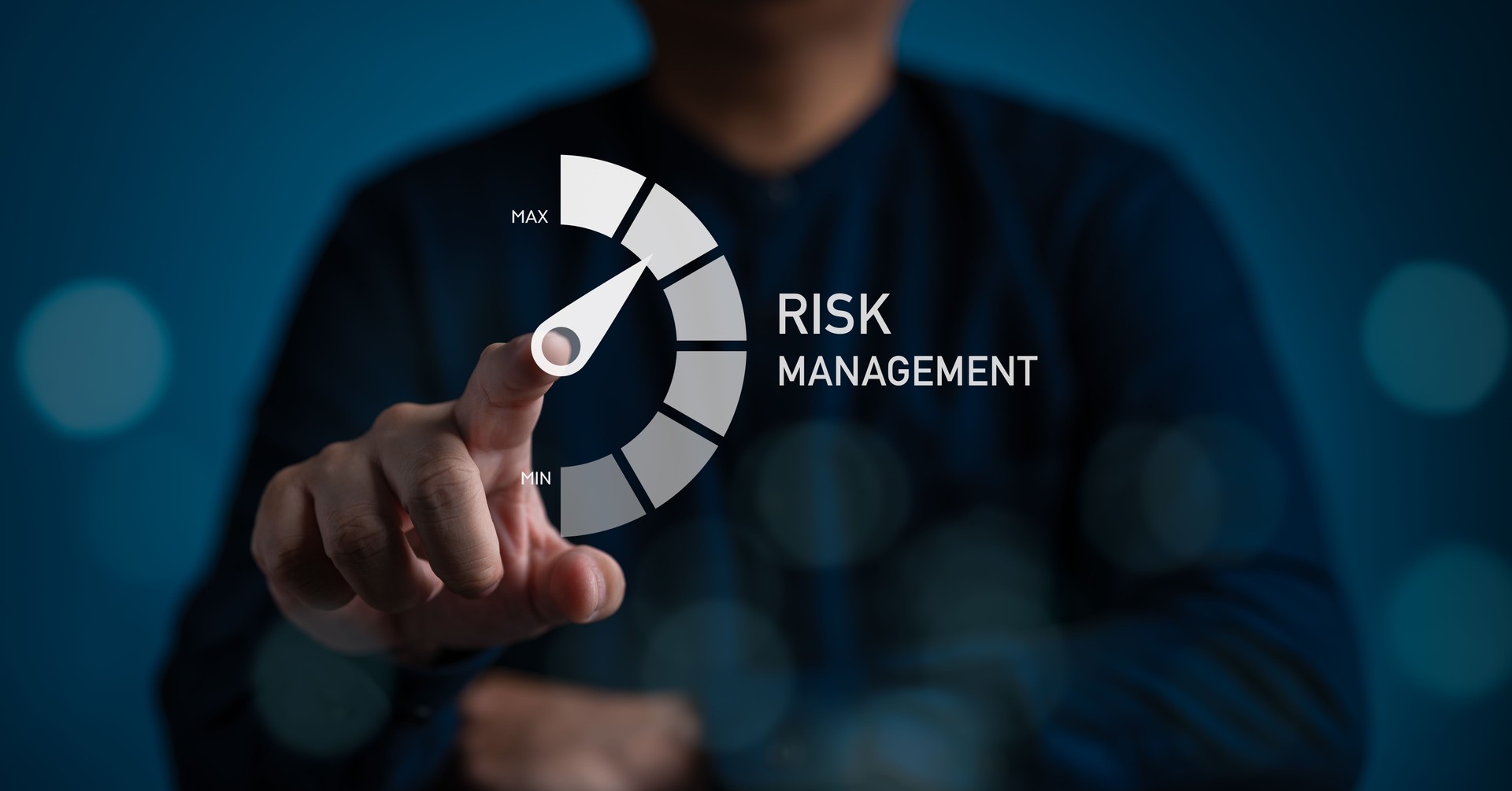 Risk management and assessment review concept. Businessman assesses for safety danger level indicators from Low to High. Business and finance risk insight for management and assessment examination.